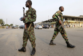 Cote d`Ivoire defense minister freed after failed talks with military rebellion